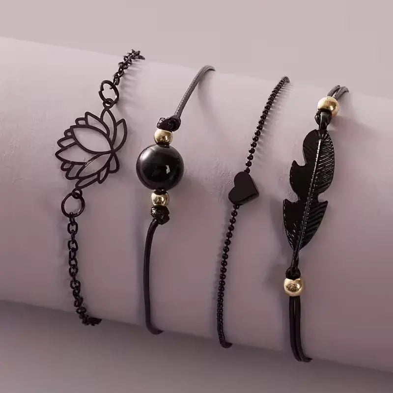 Black Lotus & Feather Bracelet Set