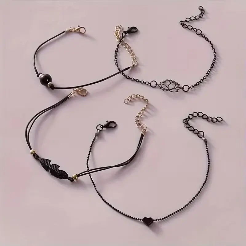Black Lotus & Feather Bracelet Set